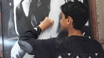 13 year old artist creates Banksy replica in Gaza