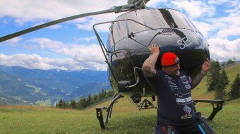 Real-Life Superhuman Strongman Lifts Helicopter on Shoulders in Austria